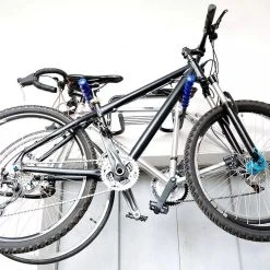 Merkloos Decopatent® Fiets Ophangsysteem Voor 2 Fietsen - Fietsenrek - Legplank Voor Helm - Fietshaak - Muurbeugel Fiets - Wandmontage 18 Merkloos Decopatent® Fiets Ophangsysteem Voor 2 Fietsen - Fietsenrek - Legplank Voor Helm - Fietshaak - Muurbeugel Fiets - Wandmontage -Fietsenwinkel 1200x1200 817